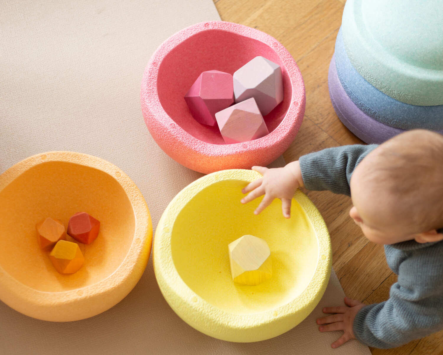 Baby Playing with Stapelstein Blocks stepping stones